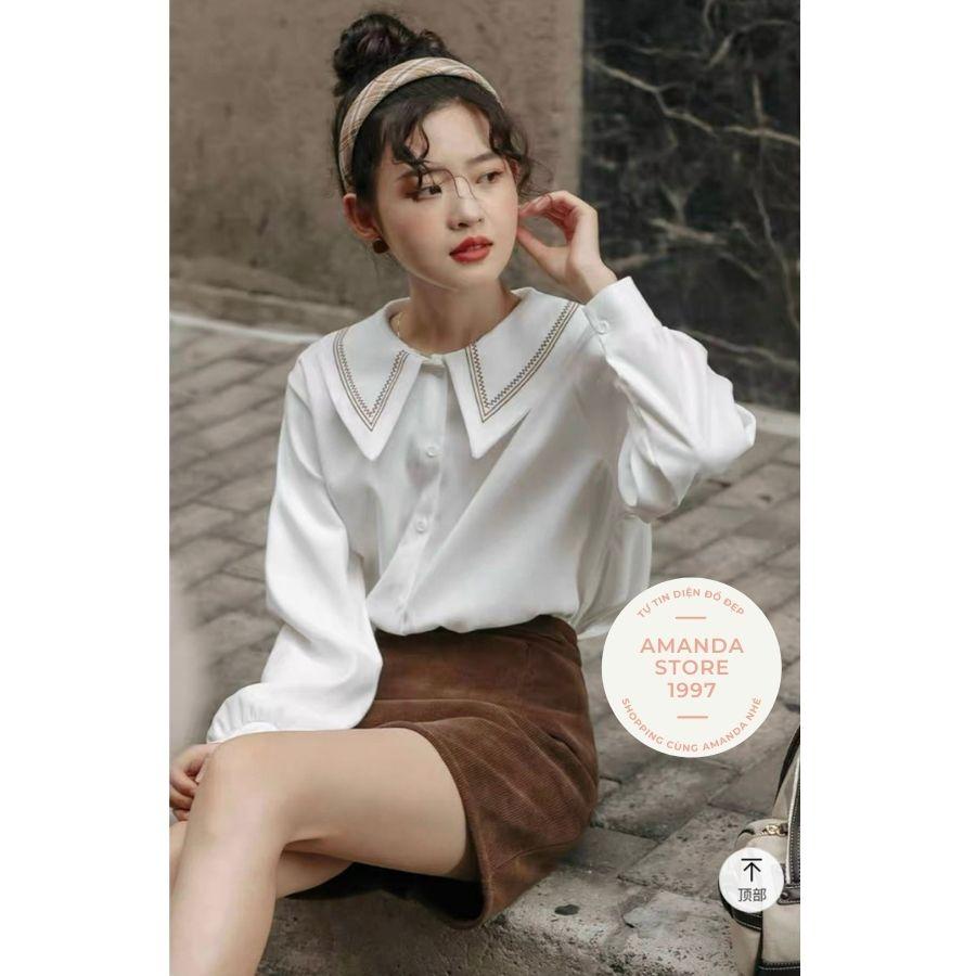 {Amanda}Áo sơ mi babydoll dài tay bồng chất tơ nhung mềm mịn. Áo sơ mi cổ bèo phối viền 2 màu trắng be hothit