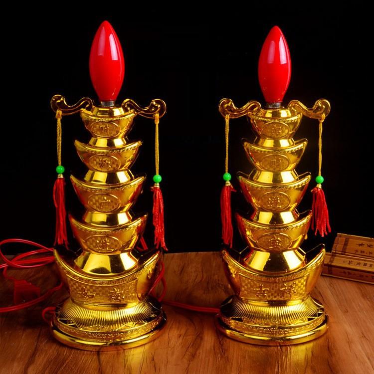 Đôi đèn thờ hình tháp thỏi vàng