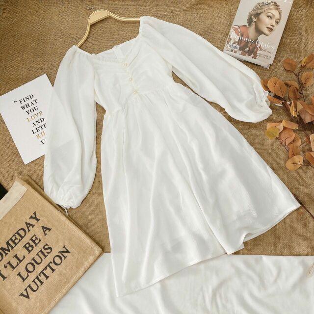 Đầm trắng nhún ngực cột nơ tay