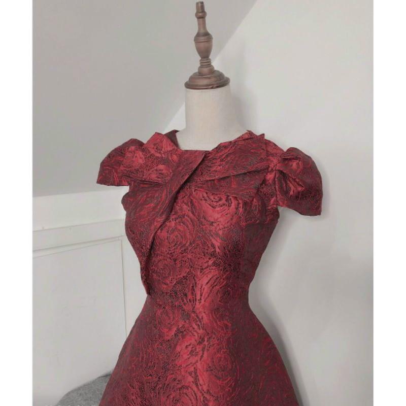 ĐẦM GẤM NƠ CỔ