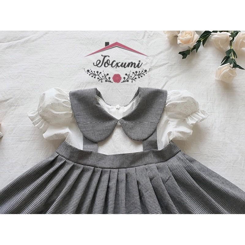 VÁY CARO ĐEN BÈO TRẮNG