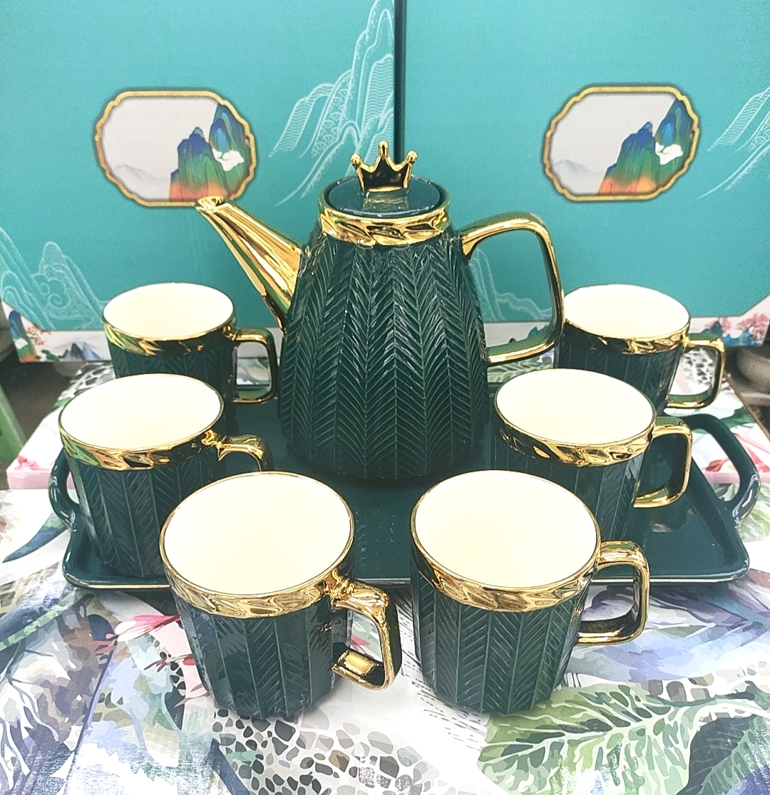 BỘ ẤM CHÉN KÈM KHAY VƯƠNG MIỆN HÌNH TRỮ NHẬT VIỀN VÀNG