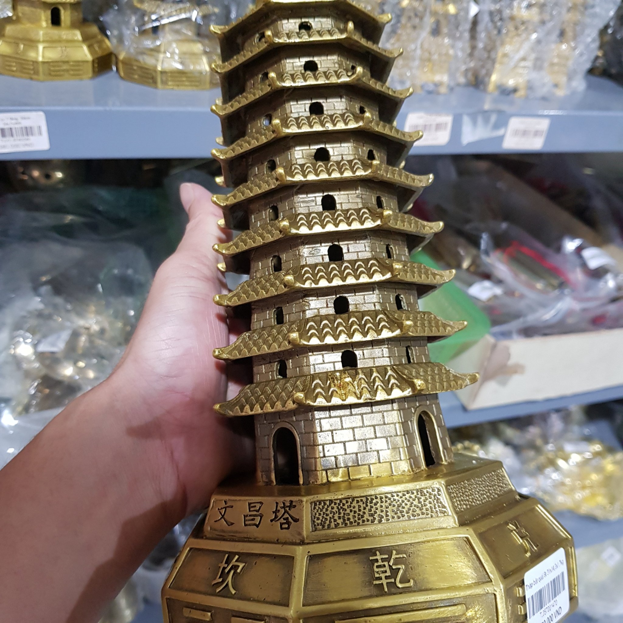 Tháp văn xương bát quái 9 tầng bằng đồng vàng