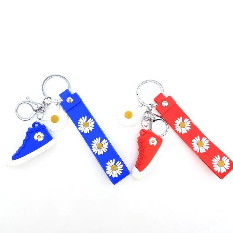 Móc khóa silicon hình giày hoa cúc