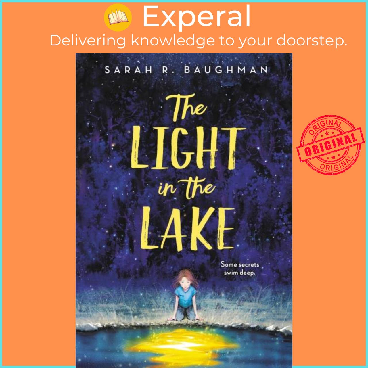 Sách - The Light in the Lake by Sarah R. Baughman (UK edition, paperback)