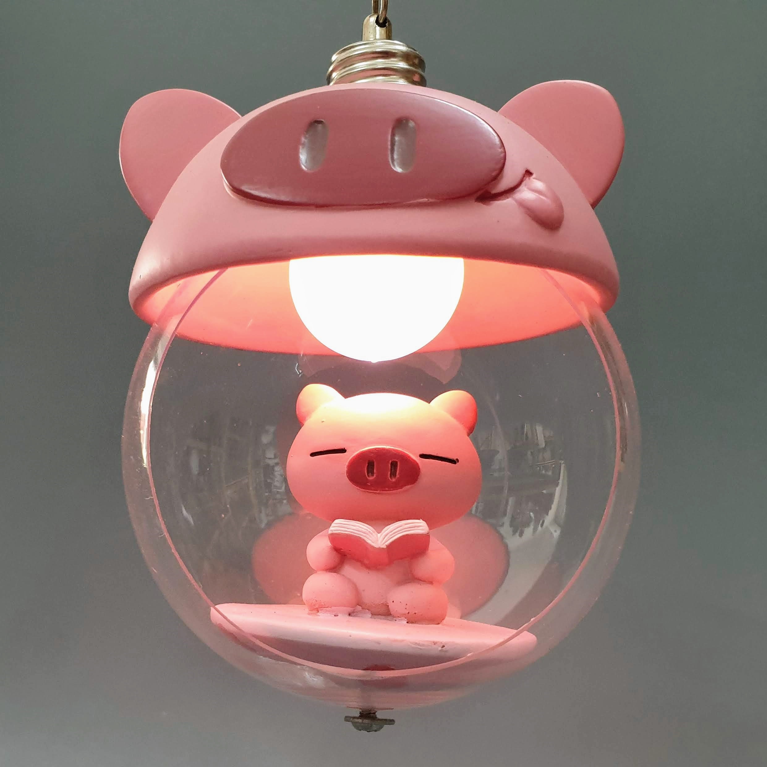 Đèn Heo Hồng Đọc Sách