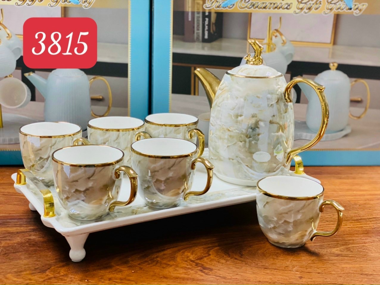 Bộ ấm chén trà sứ vân đá mạ vàng sang trọng