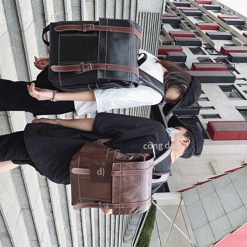 Khuyến mại mới PU ba lô retro túi đựng máy tính nam phong cách Anh Quốc học sinh cặp đi du lịch giải trí ba lô nữ thủy triều