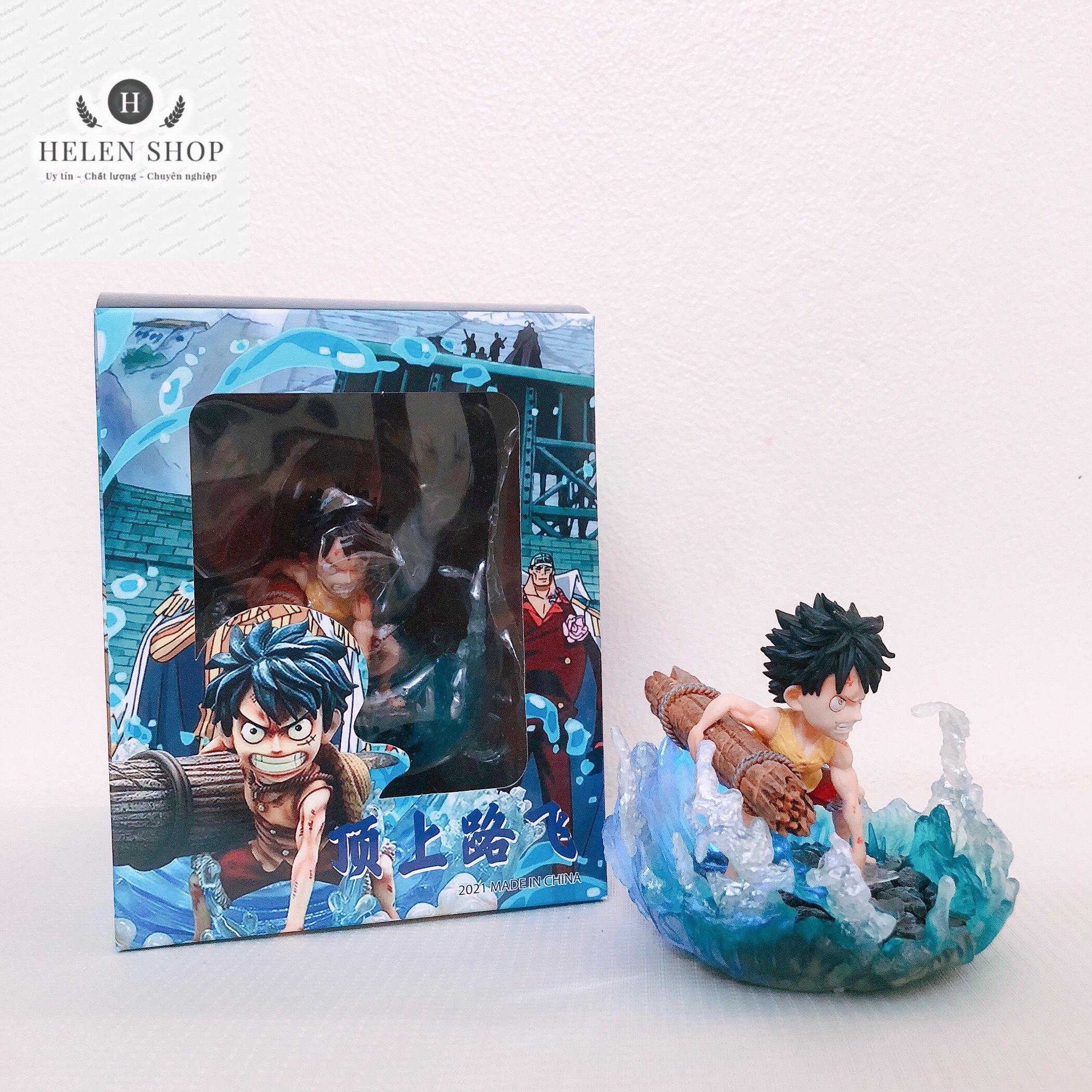 Mô hình One Piece Luffy cầm cột thuyền có đèn led trong trận chiến tổng bộ Hải Quân