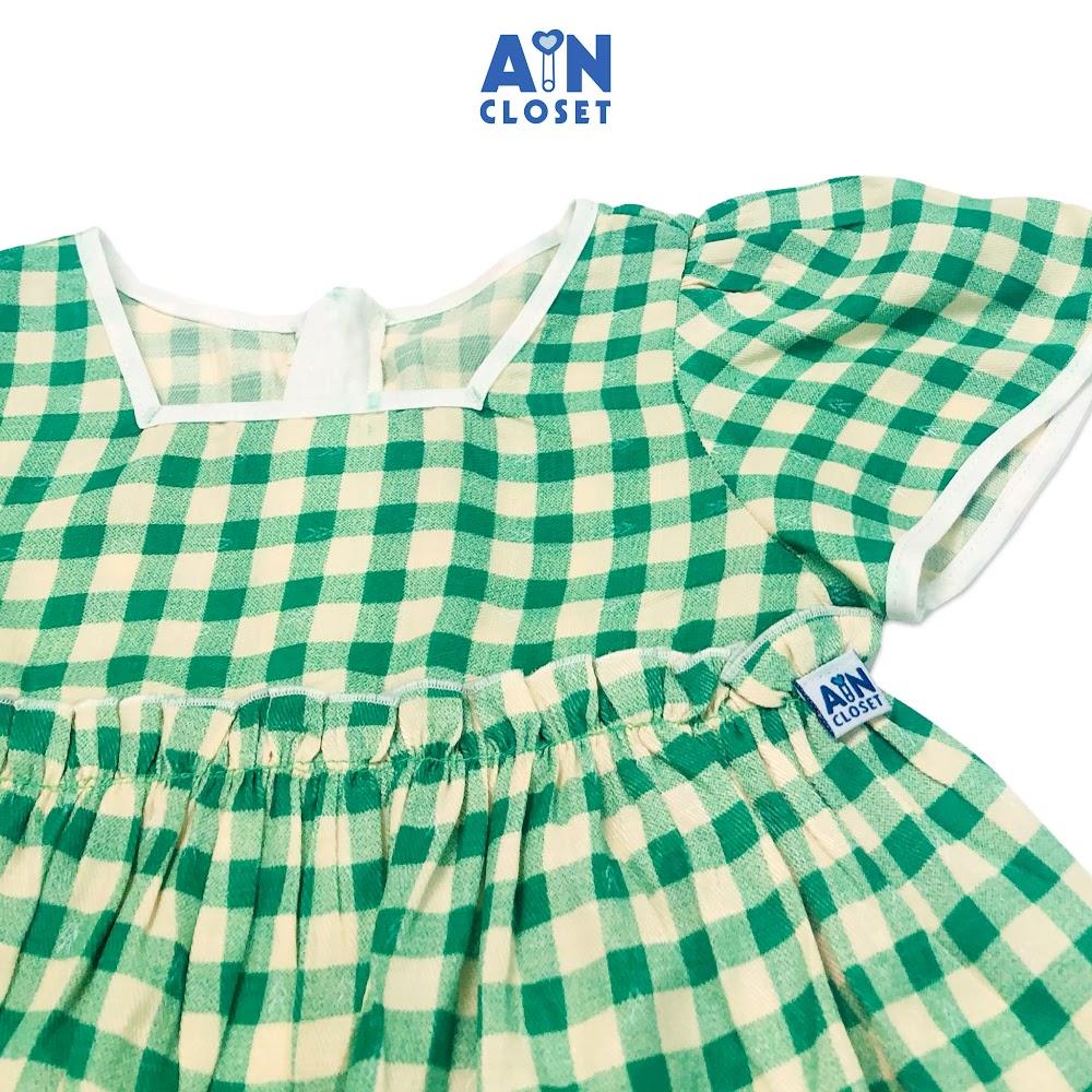 Đầm bé gái họa tiết Caro xanh lá đũi xốp - AICDBGCS3S6G - AIN Closet