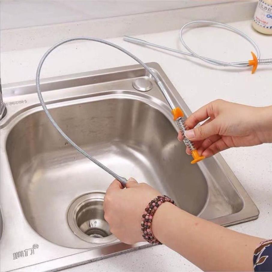 Que thông cống siêu đa năng mới
