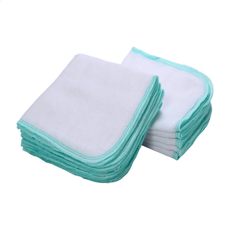 COMBO 54 MÓN ĐỒ DÙNG COTTON CHO BÉ SƠ SINH ( 10 áo tay dài, 10 tấm lót doremon, 10 tả dán in hình, 10 khăn sữa 4 lớp, 4 nón và 8 bao tay chân in hình họa tiết cùng màu, 2 khăn sữa tắm)