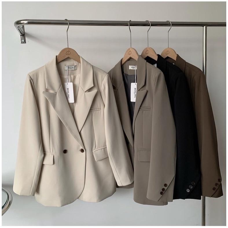 Áo blazer vạt xéo có túi