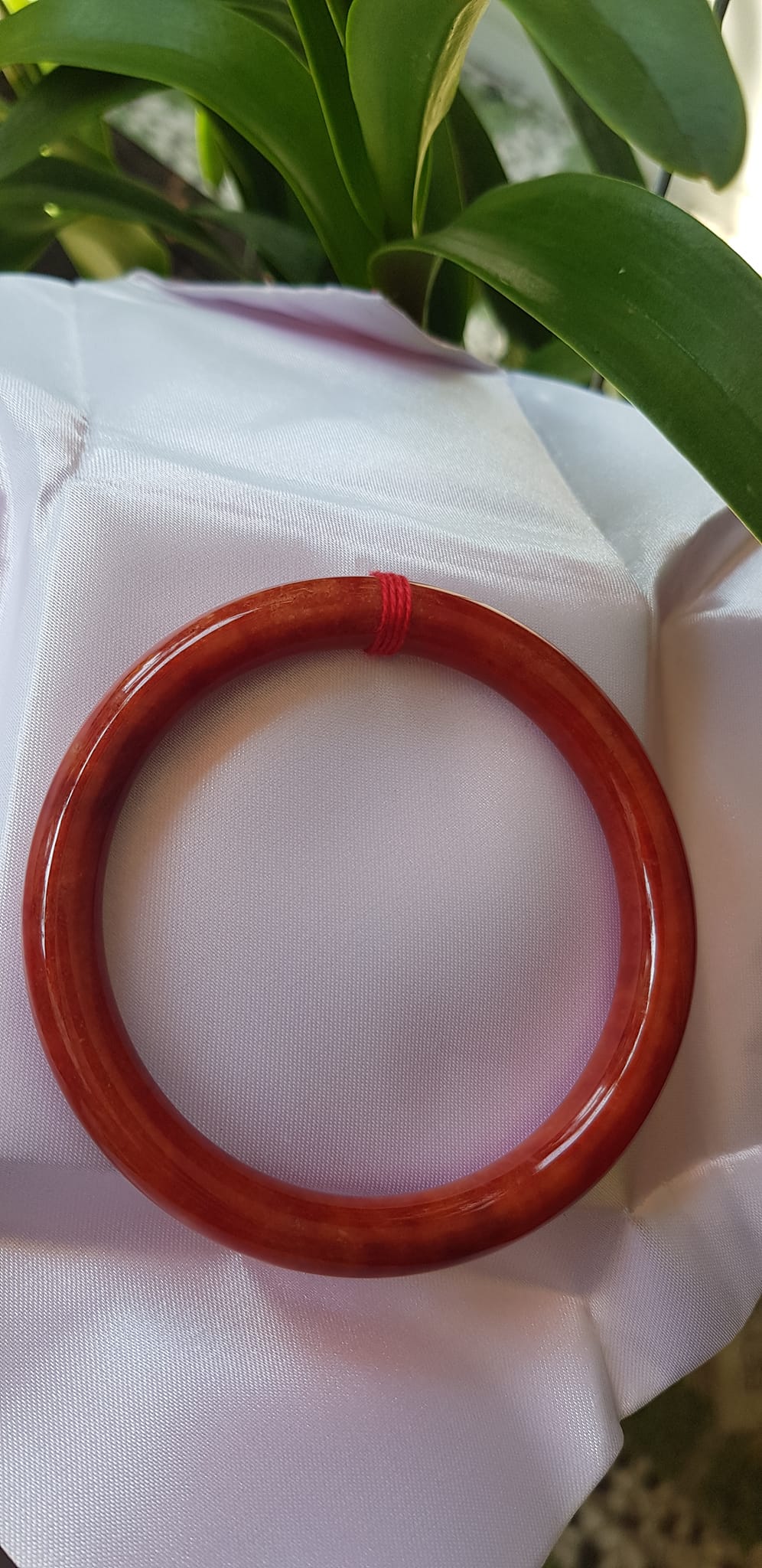 Vòng Tay Phong Thủy mới Đá Cẩm Thạch Đỏ Đẹp 60mm x cọng 8mm màu đỏ cam nhẹ đều đẹp nữ mệnh hỏa mệnh thổ 58kg - 70kg đeo hợp đẹp ạ