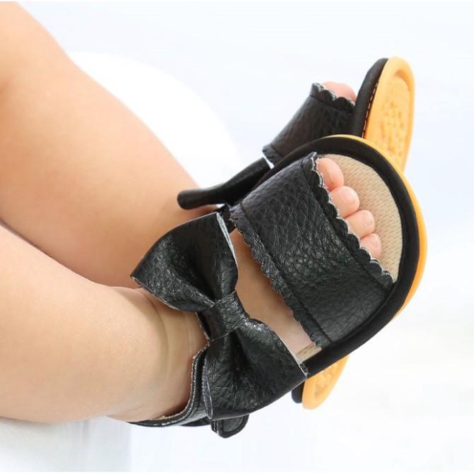 Giày sandal tập đi cho bé đế cao su chống trơn trượt chất da mềm cực chất đính nơ dễ thương cho b