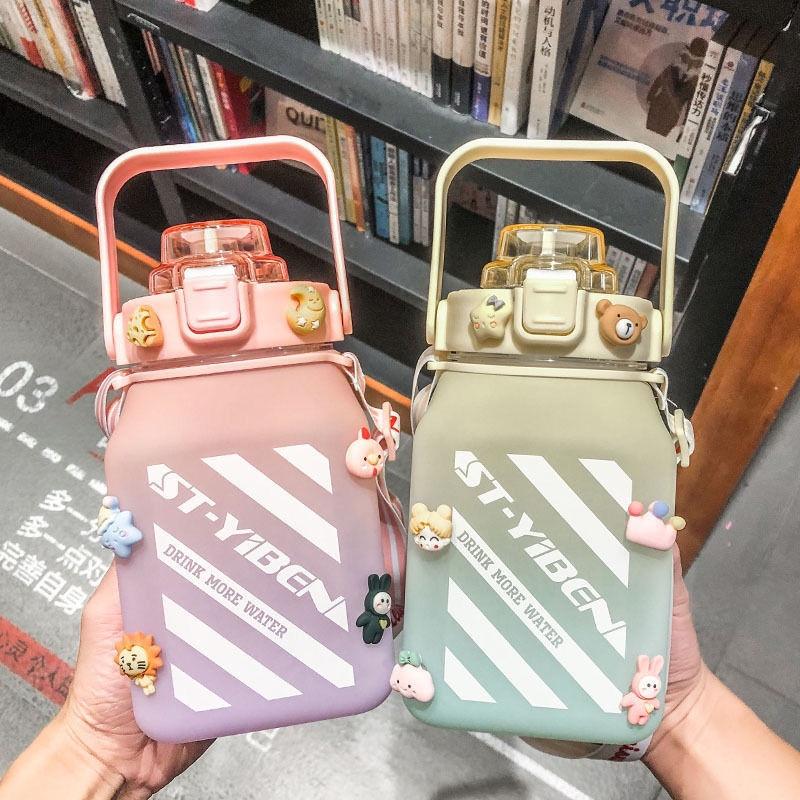 Tại chỗ ấm đun nước dung tích lớn ấm đun nước rơm rạ lưới cốc nước màu đỏ chống rơi đun nước uống trực tiếp ấm đun nước ấm đun nước lớn