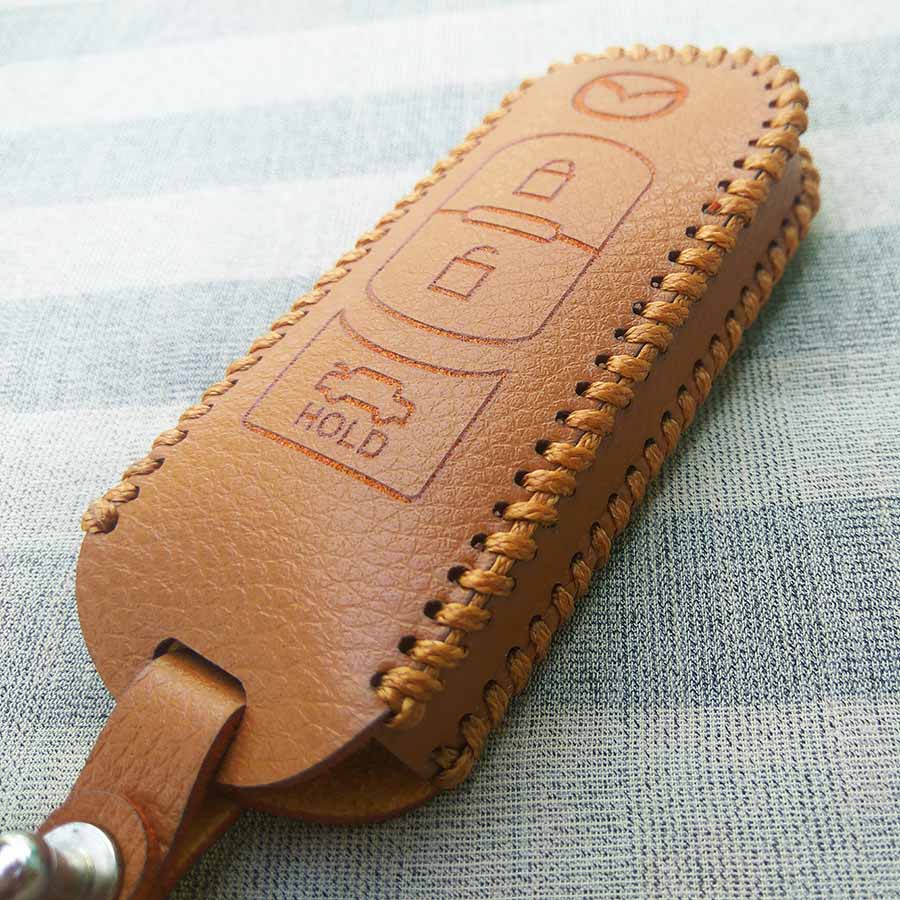 Bao da 3 nút chìa khóa smartkey xe hơi Mazda