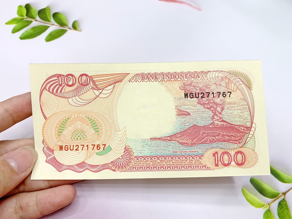 Tờ tiền thuận buồm xuôi gió Indonesia 100 Rupiah phong thủy làm quà tặng -  tặng phơi nylon bảo quản tiền
