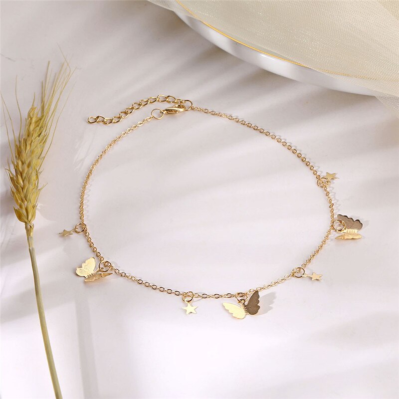 Vòng cổ choker mắt xích xi mạ vàng phối mặt bướm và ngôi sao thời trang