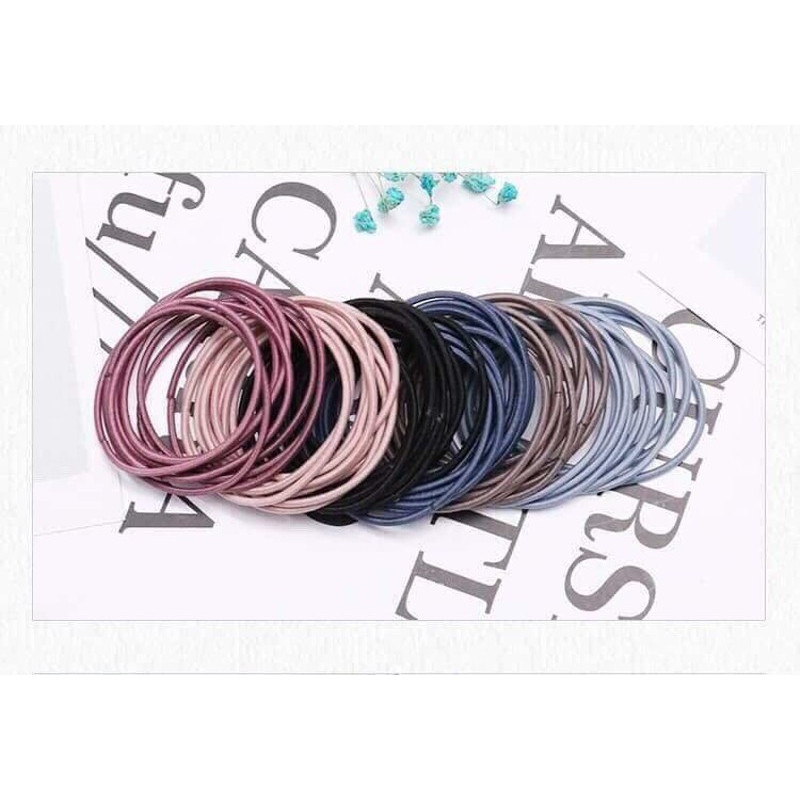 Túi 100 chun buộc tóc nhiều màu đựng túi zip