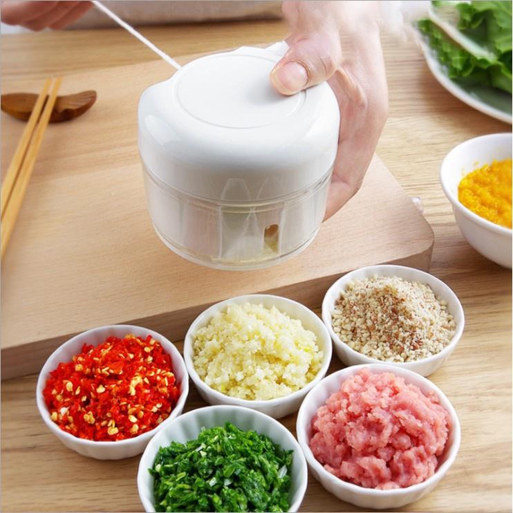 Dập xay hành tỏi dây rút cầm tay