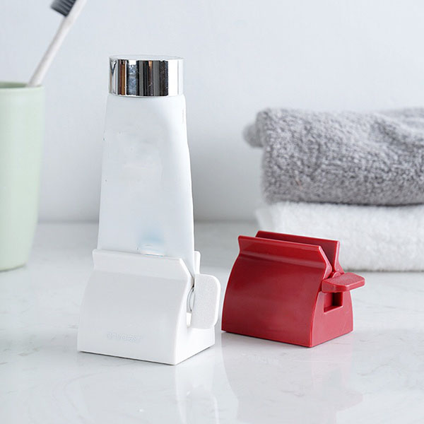 Dụng cụ nặn kem đánh răng + Tặng cọ matxa rửa mặt