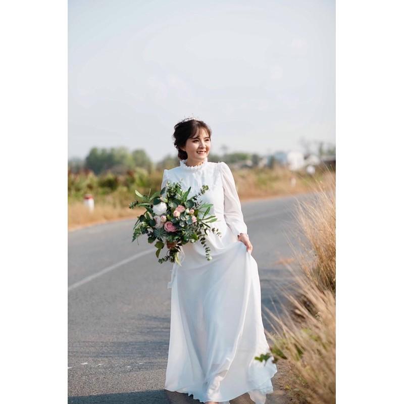 Maxi trắng cổ trụ tay dài