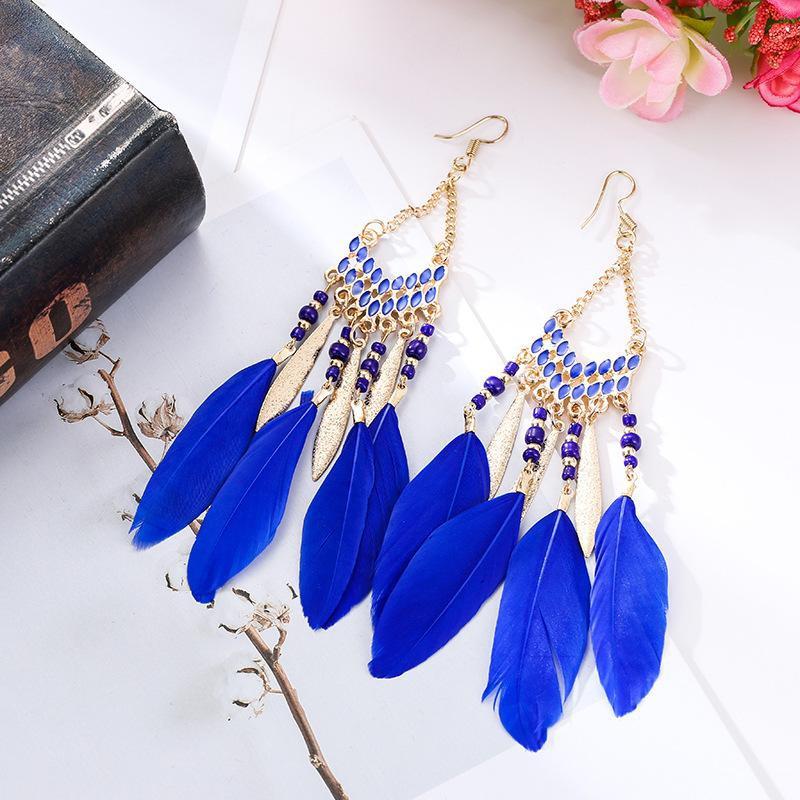 Bông tai nữ họa tiết lông vũ thích hợp đi chơi , chụp ảnh