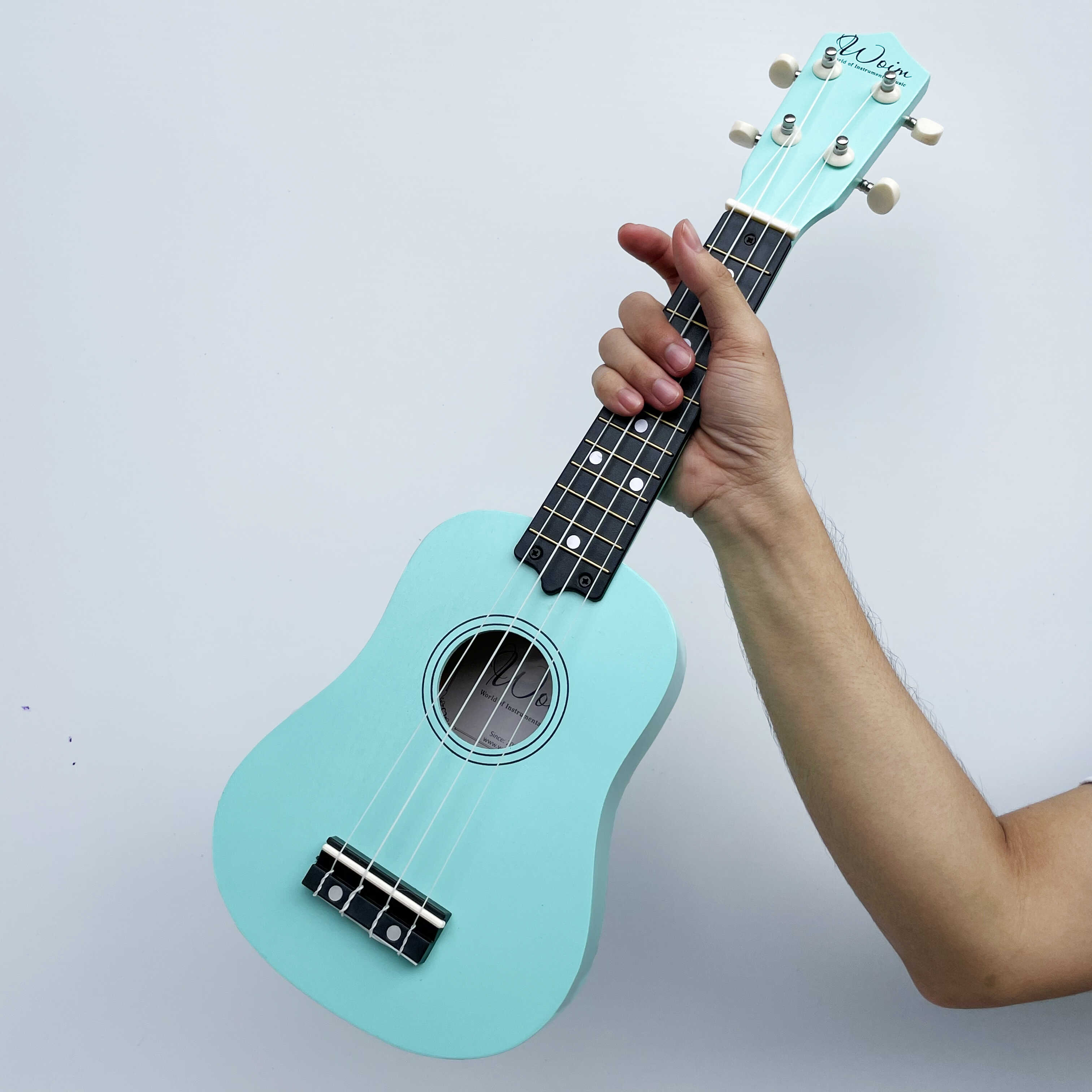 Đàn Ukulele Soprano Woim 35A15 tặng kèm bao da, capo nâng tông và máy lên dây điện tử