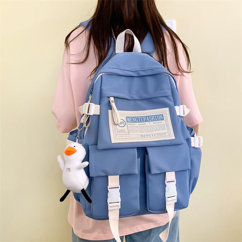 Phong cách mới nhất cặp đi học nữ học sinh trung học ba lô đơn giản sức chứa lớn mới giải trí thể thao du lịch học sinh trung học ba lô thời trang nam