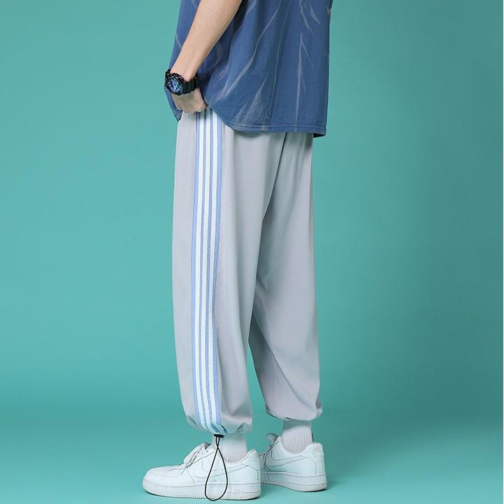 Quần Jogger Nam Nữ Unisex Quần Ống Rộng Vải Mềm Dây Rút Ở Gấu Quần - Phối 3 Sọc Điểm Nhấn- Chất Umi Da Cá
