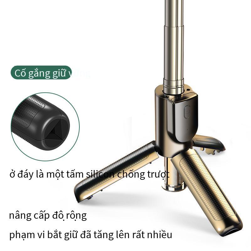 Phong cách mới nhất mini ba chân tất cả trong một selfie stick lưới màu đỏ phát sóng trực tiếp ngoài trời di động cầm tay bluetooth chống rung tạo tác vẻ đẹp