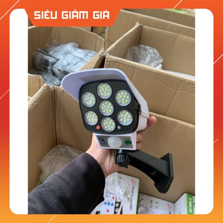 Đèn năng lượng mặt trời giả Camera chông trộm cảm ứng tự động bật, tắt, có điều khiển 3 chế độ sáng