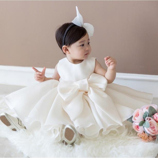 Váy công chúa trắng đính nơ lớn trước eo cho bé từ 1 đến 12 tuổi