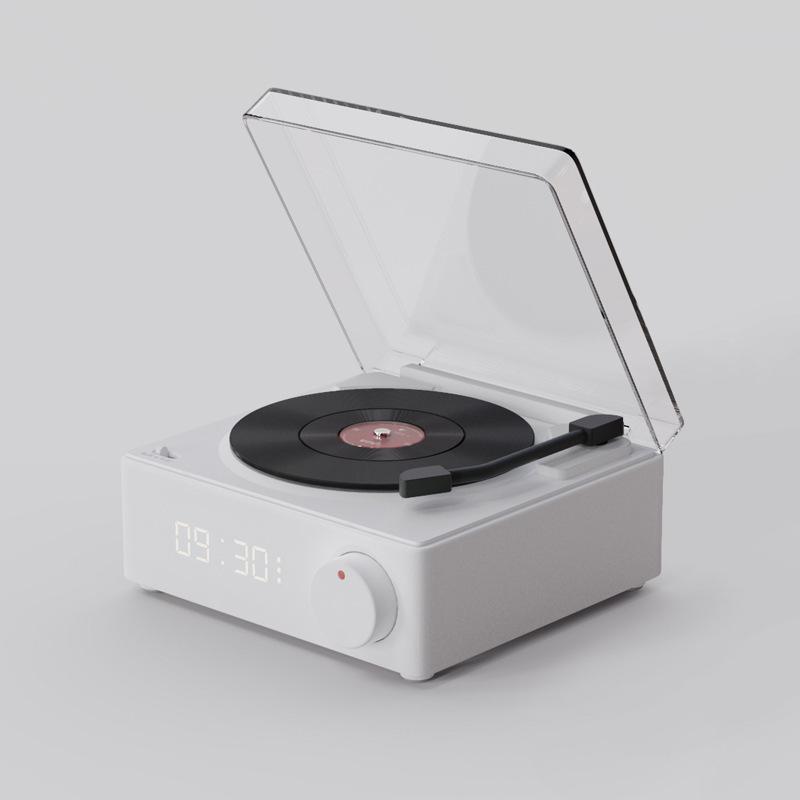 Quảng cáo sáng tạo nguyên tử máy ghi đĩa nhựa âm thanh thẻ cắm âm thanh không dây bluetooth thông minh để bàn đa chức năng loa đồng hồ đồng hồ báo thức
