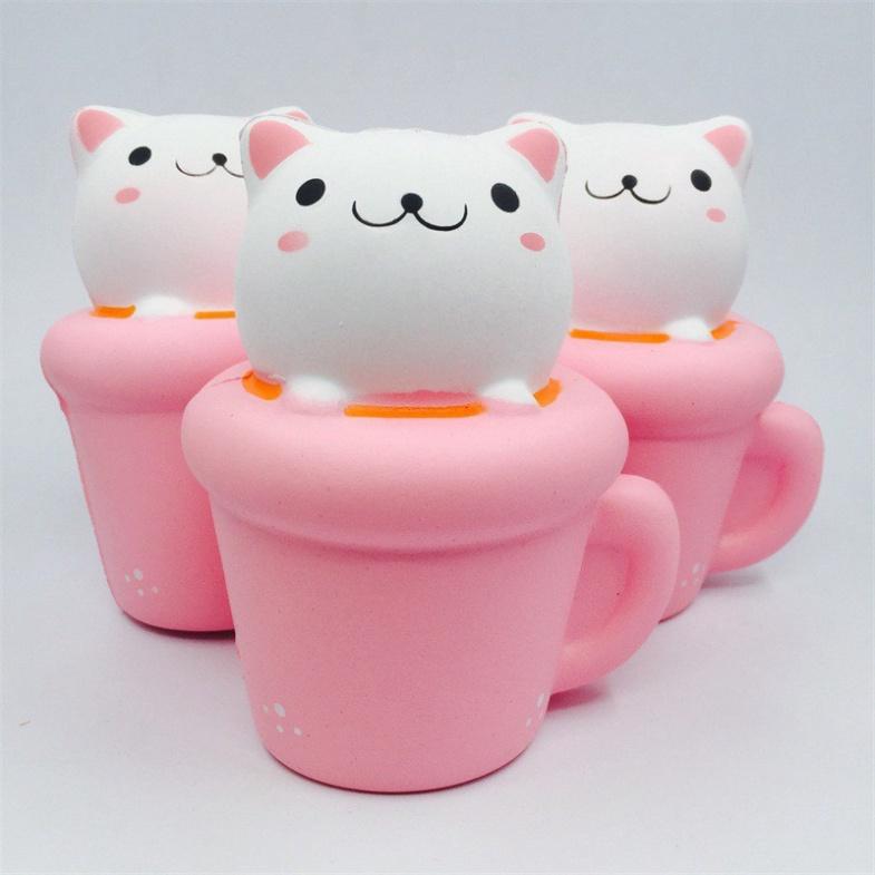 Squishy MÈO HỒNG nằm trong cốc squishy cốc thỏ hồng dễ thương ngộ nghĩnh