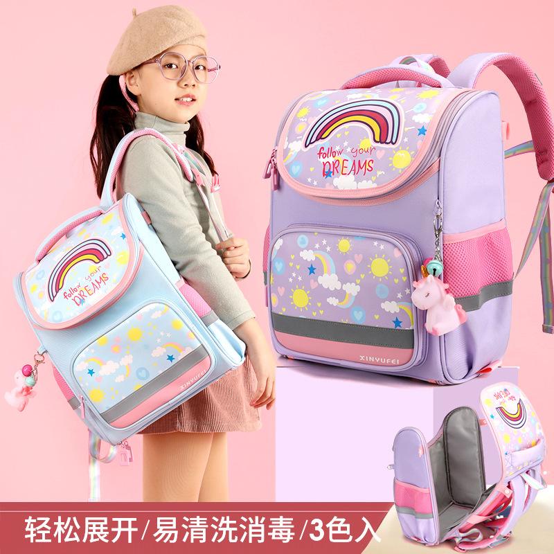 Cặp học sinh tiểu học mới thuận lợi nhất cho lớp một, hai, ba, bốn, năm, sáu, giải nén dung lượng lớn, bảo vệ sườn núi, ba lô cầu vồng chống nước thủy triều
