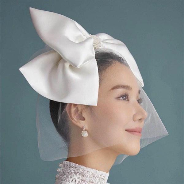 Nơ phi bóng lớn kèm voan ngắn cài tóc cô dâu sp220679