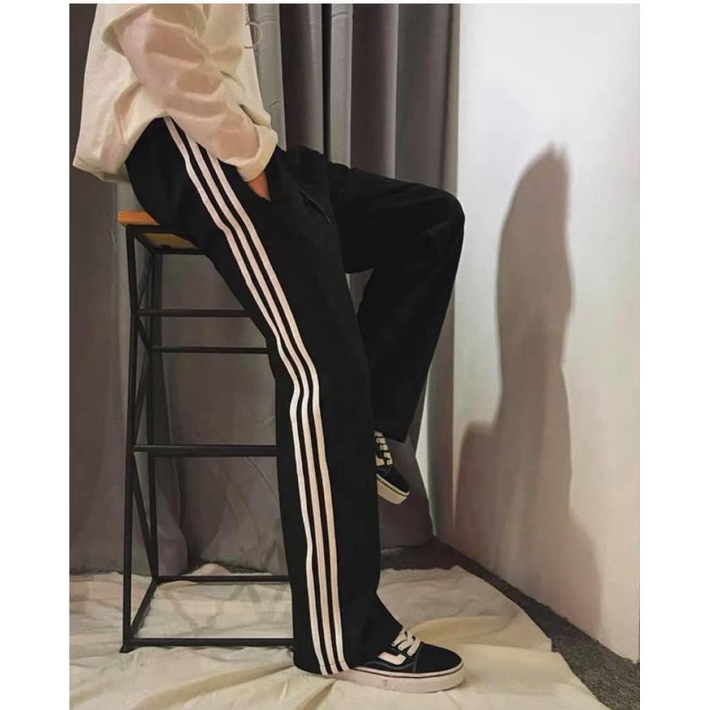 Quần 1 sọc + 3 sọc ống rộng