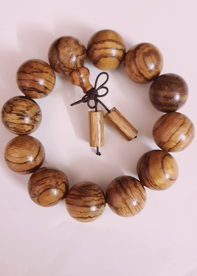 Vòng tay nam nữ gỗ đàn hương da báo đính gỗ hình trụ 15-18- 20 ly