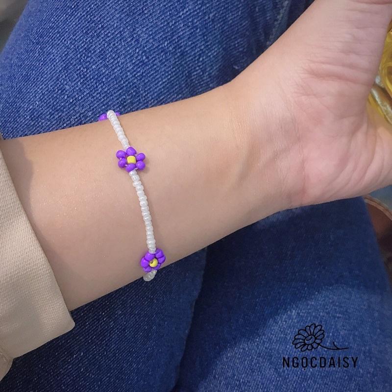 N140 Vòng tay handmade hạt cườm hoa daisy tím dây trắng dễ thương