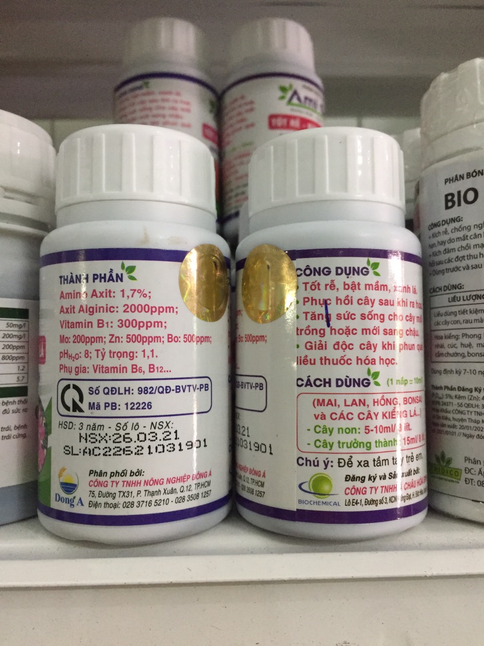 Phân bón sinh học AMIGREEN Kích rễ, kích mầm, giải độc cây - Chai 100ml - Ami Green Tốt rễ, bật mầm, xanh lá cây trồng