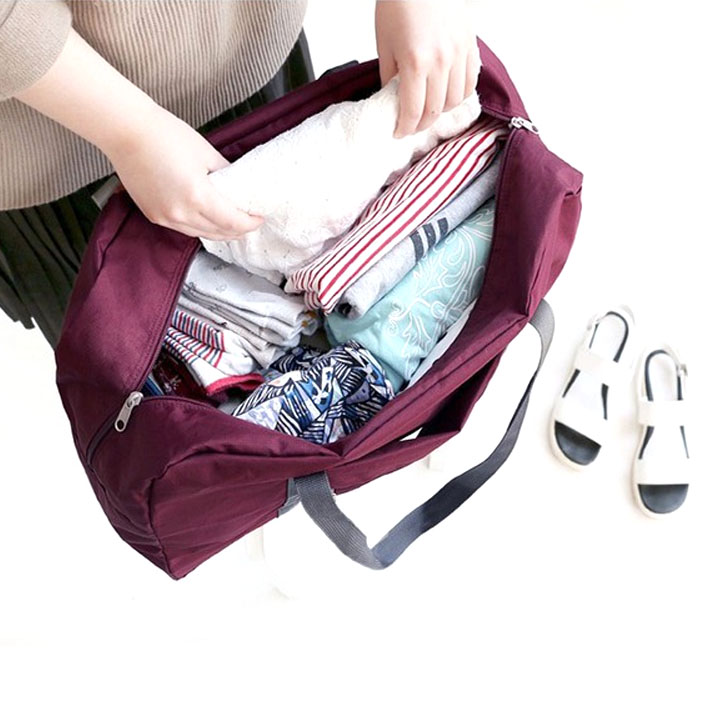 Túi du lịch chống thấm nước, xếp gọn, có thể xách tay hoặc gắn vali kéo tiện dụng