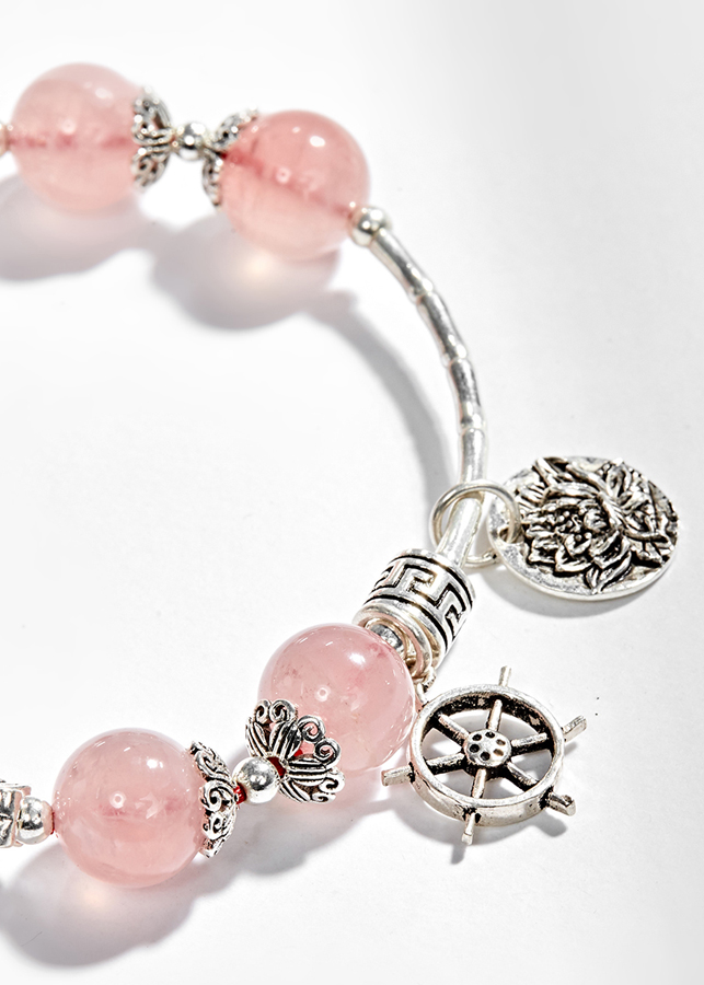 Vòng tay thạch anh hồng phối charm chuông bạc Ngọc Quý Gemstones