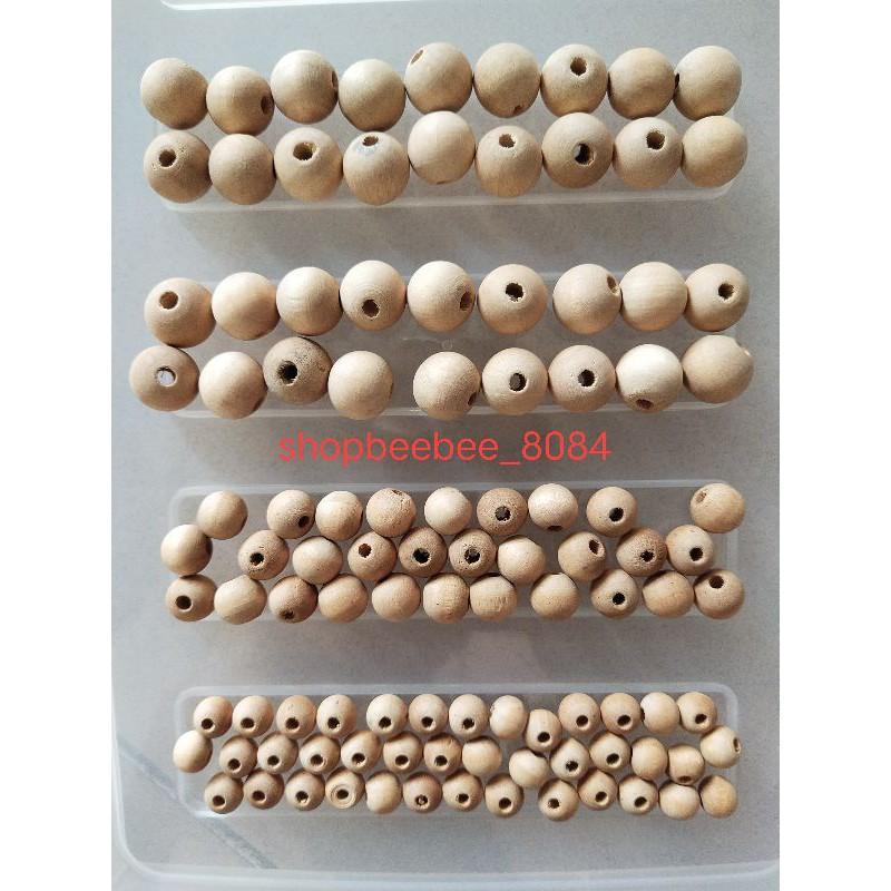 Túi 50 gam hạt gỗ trơn 3 size, hạt xâu luồn chuỗi cho trẻ