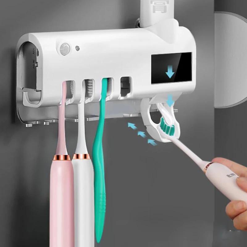 Giá đỡ bàn chải đánh răng có chức năng khử trùng bằng tia cực tím với đèn LED, Khe cắm chính cho 4 bàn chải đánh răng + Hộp đựng kem đánh răng 4 cốc màu trắng