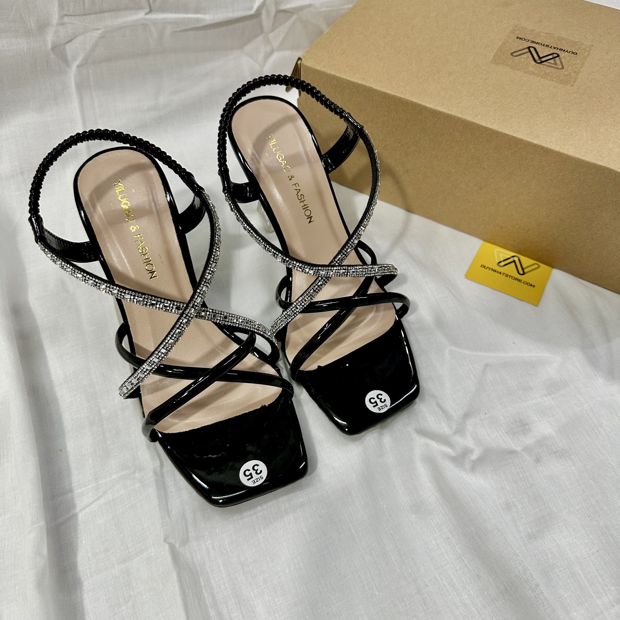 Dép Giày Sandal Cao Gót Quai Ngang Chéo Giày Duy Nhật Store Phối Kim Tuyến Da Bóng Dây Mảnh Gót Vuông Trong Nhọn Đẹp 7cm Đen Thun