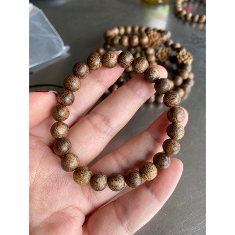 Vòng trầm hương mix charm hoa sen bằng Trầm