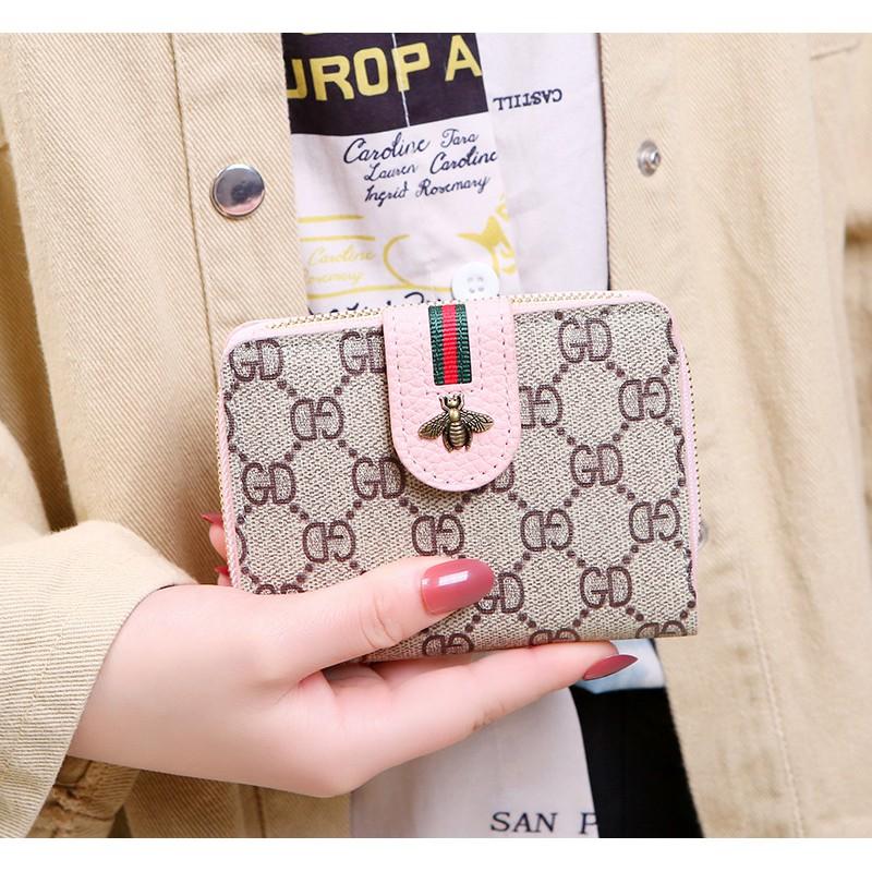 Ví nữ cầm tay khóa kéo hình con ong dể thương