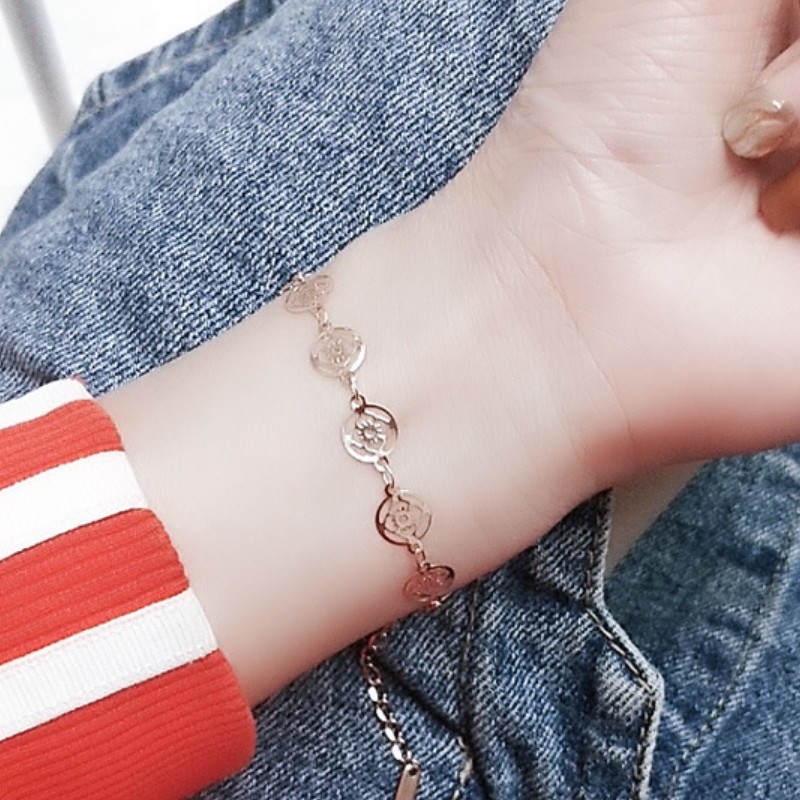 Lắc Tay Nữ Hoa Văn Titan Ko Đen TT 2778